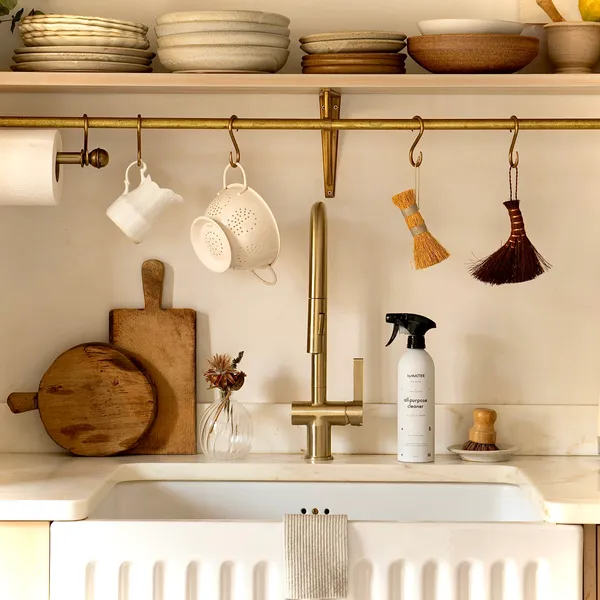 Clean cottage kitchen sink and faucet